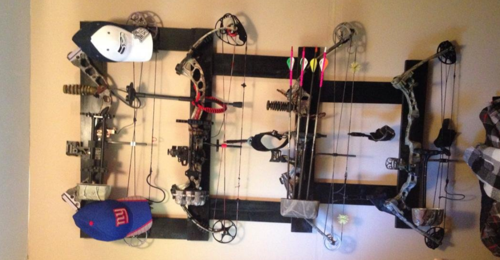 Compound bow hanging vertically