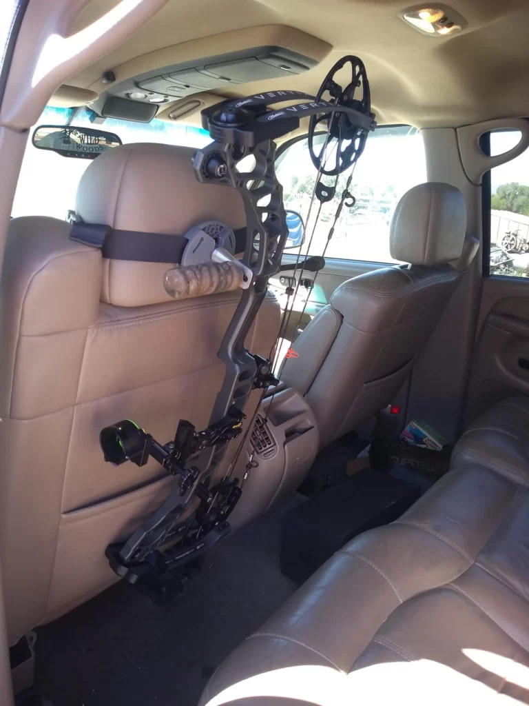 compound bow in a car